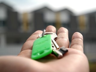 house keys in hand